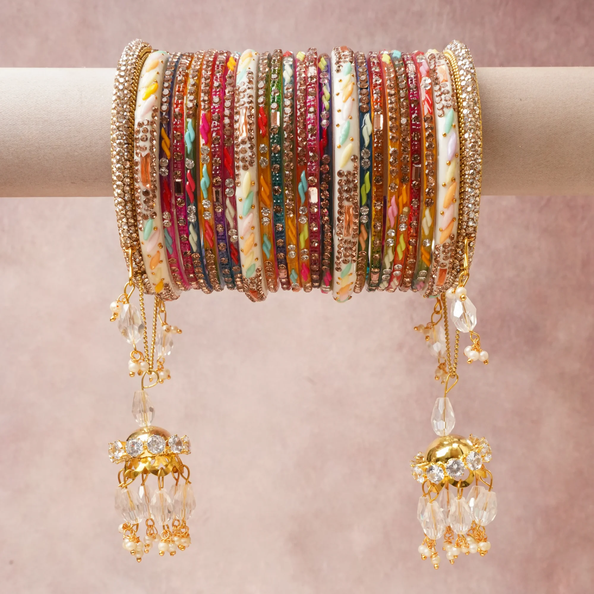 A commanding Multi colour anchors this beautiful set, enriched with accents of Clear, Pearl White, Pale Pink, Pale Green, Pale Blue, Pale Yellow, Pale Orange that add depth and dimension.

Featuring a striking composition of Gold-toned Metal, Enamel, Rhinestones, Glass, Simulated Pearls, this set carries intricate craftsmanship and strong presence. Grand in form, it is created for moments that deserve to be marked.